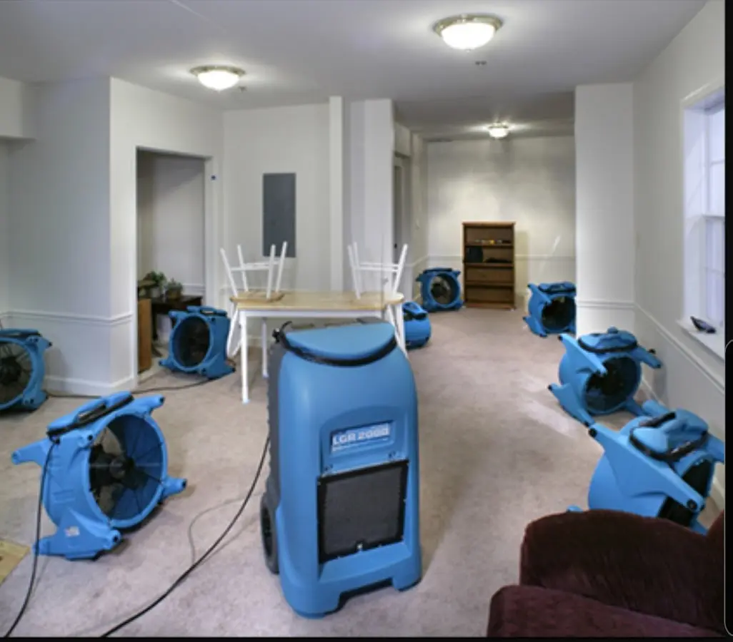 Air movers and dehumidifier setup for Water Damage Restoration in Orrville